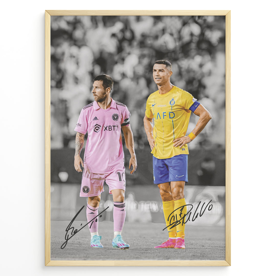 Plakat of Lionel Messi in pink Inter Miami jersey and Cristiano Ronaldo in yellow Al Nassr jersey, with printed signatures and black-and-white background.