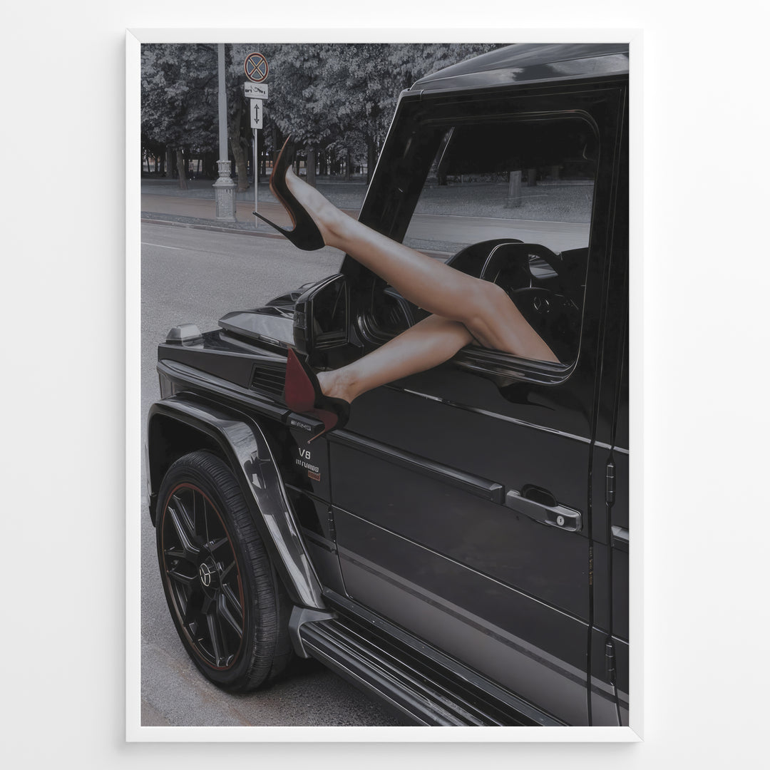 Fashion Plakat | Luxury Escape: Legs in High Heels Through Mercedes G-Wagon Window Plakaty.dk | Woman's legs in high heels sticking out of a Mercedes-Benz G-Wagon window in an urban street scene.