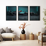 Indlæs billede til gallerivisning Triptych wall art plakat of the Mercedes-AMG Petronas F1 Team W15 Formula 1 car displayed in a modern living room with black leather furniture.
