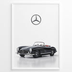 Indlæs billede til gallerivisning Framed minimalist poster featuring a black Mercedes-Benz 300SL Roadster convertible with red seats and Mercedes logo above on white background.
