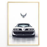 Indlæs billede til gallerivisning Illustration of a classic white Pontiac Trans Am viewed from the front with a bird emblem above.

