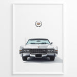 Indlæs billede til gallerivisning Front-facing illustration of a white classic convertible car with an emblem above in a minimalist framed poster.
