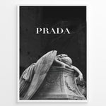 Indlæs billede til gallerivisning Fashion Plakat | Prada-Inspired Angel Statue – Fashion and Art Black and White Poster Plakaty.dk | Black and white artwork of a mourning angel statue with the word &quot;PRADA&quot; above, blending classical art and modern fashion
