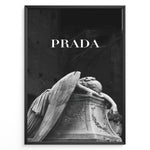 Indlæs billede til gallerivisning Fashion Plakat | Prada-Inspired Angel Statue – Fashion and Art Black and White Poster Plakaty.dk | Black and white artwork of a mourning angel statue with the word &quot;PRADA&quot; above, blending classical art and modern fashion
