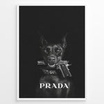 Indlæs billede til gallerivisning Fashion Plakat | Prada-Inspired Art Featuring Fierce Dog with Gun Plakaty.dk | Black Doberman with a studded collar holding a handgun in its mouth, set against a dark background with the word &quot;PRADA&quot; in bold white text.
