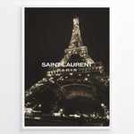 Indlæs billede til gallerivisning Fashion Plakat | Saint Laurent Eiffel Tower Night View – Paris Fashion Wall Art Plakaty.dk | Illuminated Eiffel Tower at night with &quot;Saint Laurent Paris&quot; logo centered in white text.

