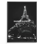 Indlæs billede til gallerivisning Fashion Plakat | Saint Laurent Eiffel Tower Poster – Black &amp; White Paris Fashion Print Plakaty.dk | Black and white photo of the Eiffel Tower illuminated at night with “Saint Laurent Paris” text overlay, capturing the essence of French fashion and elegance.

