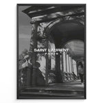 Indlæs billede til gallerivisning Fashion Plakat | Saint Laurent Paris – Architectural Elegance in Monochrome Plakaty.dk | Black and white photo of classical architecture with arches and columns, overlaid with the Saint Laurent Paris logo, conveying elegance and luxury.
