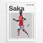 Indlæs billede til gallerivisning Poster showing a football player in a red and white uniform celebrating, with large text reading “Saka” at the top and a clean modern graphic design layout.
