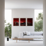 Indlæs billede til gallerivisning Triptych wall art plakat featuring the Scuderia Ferrari SF-24 Formula 1 car in a modern black-and-white living room with leather furniture.
