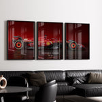 Indlæs billede til gallerivisning Triptych wall art plakat featuring the Scuderia Ferrari SF-24 Formula 1 car in a modern black-and-white living room with leather furniture.
