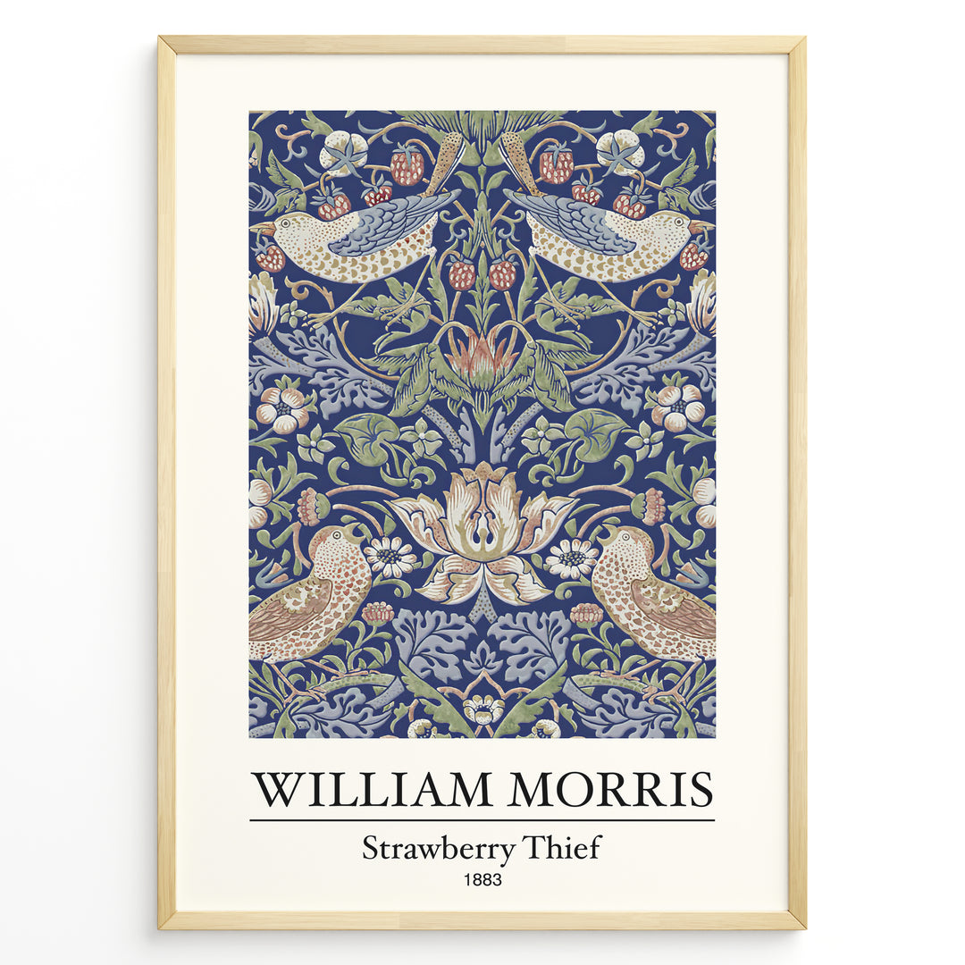 Framed William Morris Strawberry Thief 1883 art print plakat showing birds and strawberries with ornate floral patterns on a navy background.