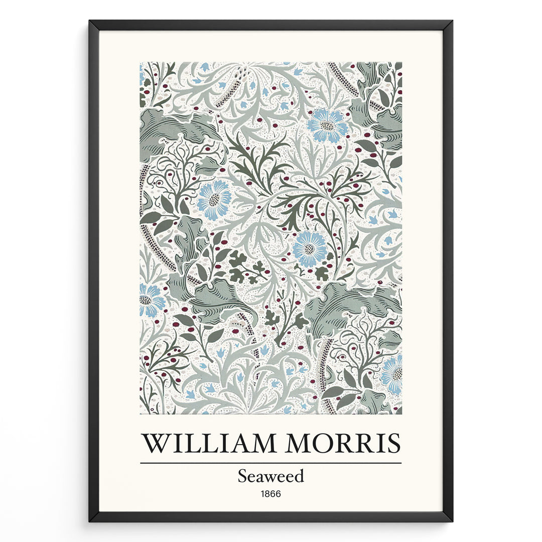 Framed William Morris Seaweed 1866 art print plakat featuring intricate seaweed-inspired floral and leaf motifs in blue and green on a cream background.