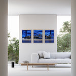 Indlæs billede til gallerivisning Triptych wall art plakat of the Williams Racing FW46 Formula 1 car with a bold blue background, displayed in a contemporary living room with black leather furniture.
