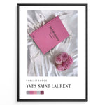 Indlæs billede til gallerivisning Fashion Plakat | Yves Saint Laurent Pink Book on Silk – Paris Fashion Decor Plakaty.dk | Yves Saint Laurent pink Catwalk book placed on white silk fabric with pink roses beside it, representing Parisian luxury and soft elegance.
