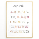 Indlæs billede til gallerivisning Pastel-colored alphabet poster showing uppercase and lowercase letters arranged on handwriting lines, framed as educational kids’ wall art.
