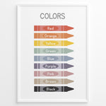 Indlæs billede til gallerivisning Educational poster showing colorful crayons labeled with color names including red, orange, yellow, green, blue, purple, pink, brown, and black, framed as children’s learning wall art.
